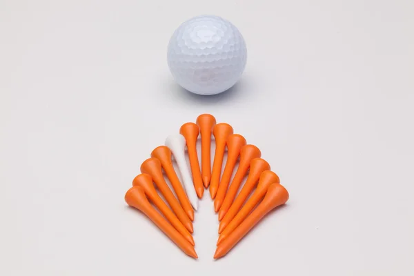 Golf tees and golf ball on the white background — Stock Photo, Image