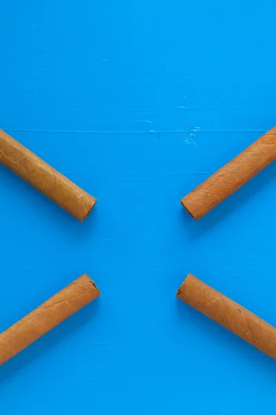 Detail of luxury Cuban cigars on the blue table — Stock Photo, Image