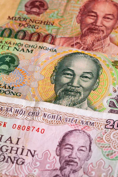 Different Vietnamese Dong banknotes on the table — Stock Photo, Image