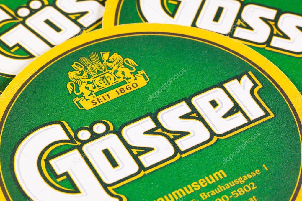 GERMANY,DRESDEN - September 20,2014:Beermats from Gosser beer.Gosser beer is the main brand of the Goss brewery in the Styrian city of Leoben, one of the largest and most-well known Austrian beer breweries.