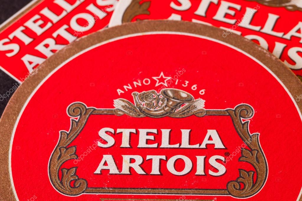 ENGLAND,LONDON - November 11, 2014:Beermats from Stella Artois.It has been brewed in Leuven, Belgium, since 1926.Stella Artois is one of the prominent brands of Anheuser-Busch InBev