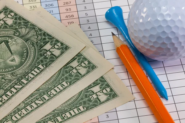 Golf uitrustingen en ons dollar bankbiljetten — Stockfoto