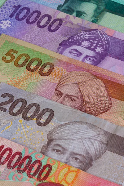 Different Indonesian rupiah on the table — Stock Photo, Image