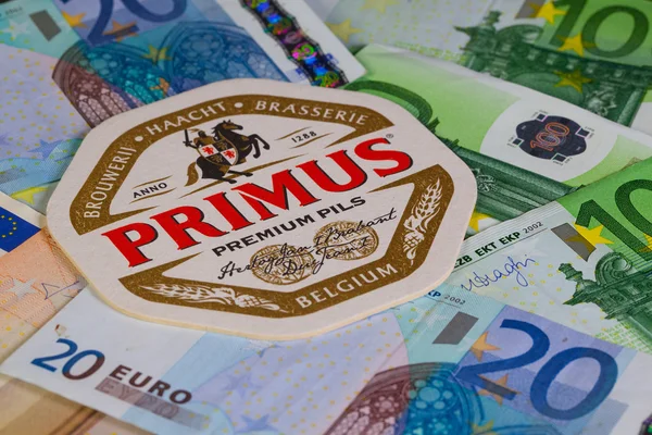 Beermat from Primus beer and EUR money. — Stock Photo, Image