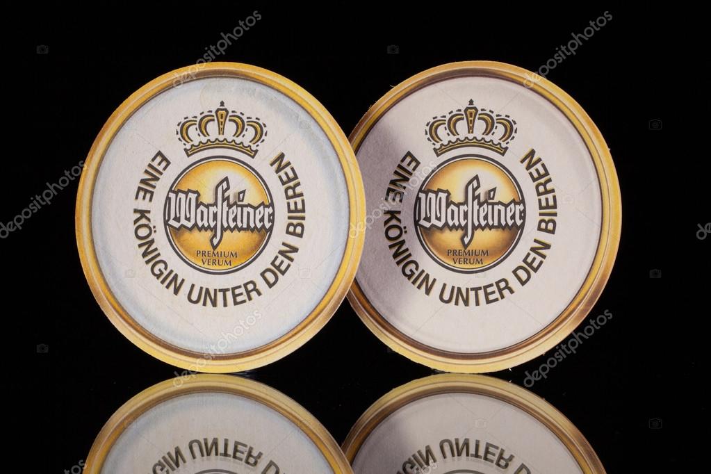 Germany,Dresden - September 20,2014:Beermats from Warsteiner beer.The Warsteiner Brewery was founded in 1753, and today is one of the largest privately held breweries in Germany.