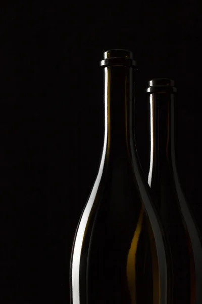 Silhouettes of elegant wine bottles — Stock Photo, Image