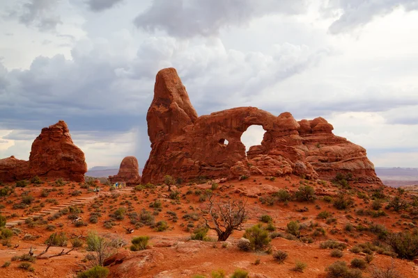 Tourists in Arches National Park. - HDR Image. — Stock Photo, Image