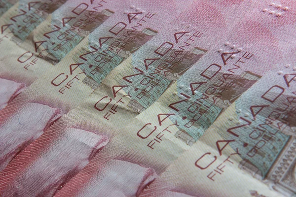 Canadian banknotes of the same value — Stock Photo, Image