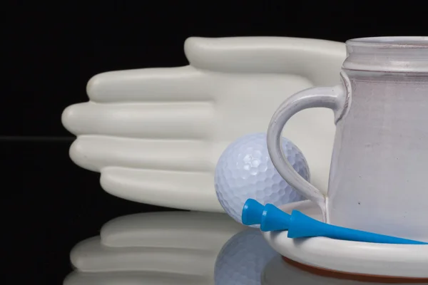 Ceramica mano e attrezzature da golf — Foto Stock