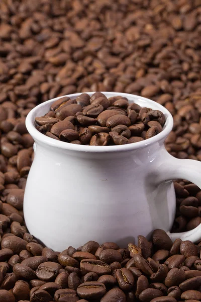 Grains de café et tasse de café — Photo