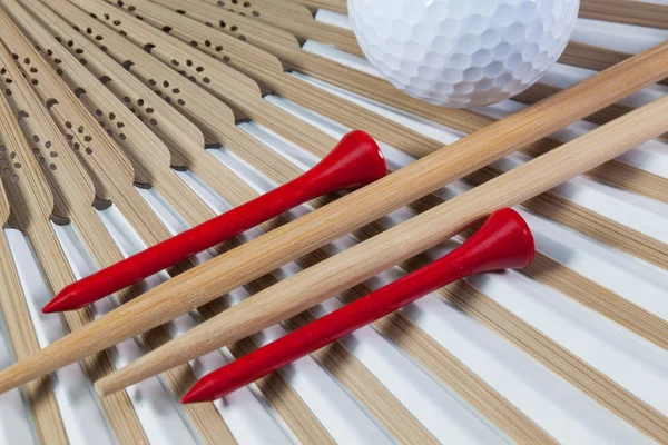 Abanico de mano japonés típico, palillos y equipos de golf — Foto de Stock