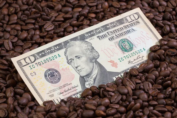 Coffee beans and US banknote — Stock Photo, Image