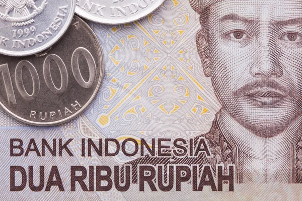Rupia indonezyjska pieniądze banknotów i monet — Zdjęcie stockowe