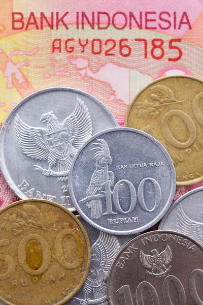 Sedler og mønter i Rupiah i Indonesien - Stock-foto