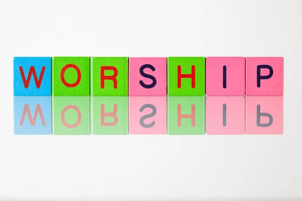 Worship  - an inscription from children's  blocks — Stock Photo, Image