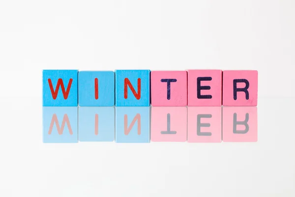 Зима - надпись из детских блоков — стоковое фото