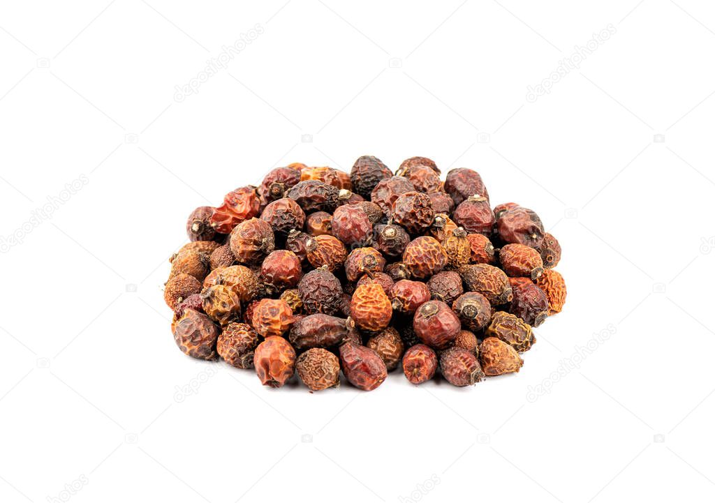 Selective focus. Dried rosehip isolated on white background. Alternative medicine.
