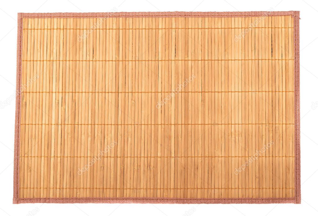 Top view of brown food mat isolated on white background. Traditional kitchen utensils.