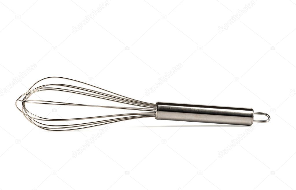 Stainless steel whisk isolated on white background. Kitchen utensils. Copy space.