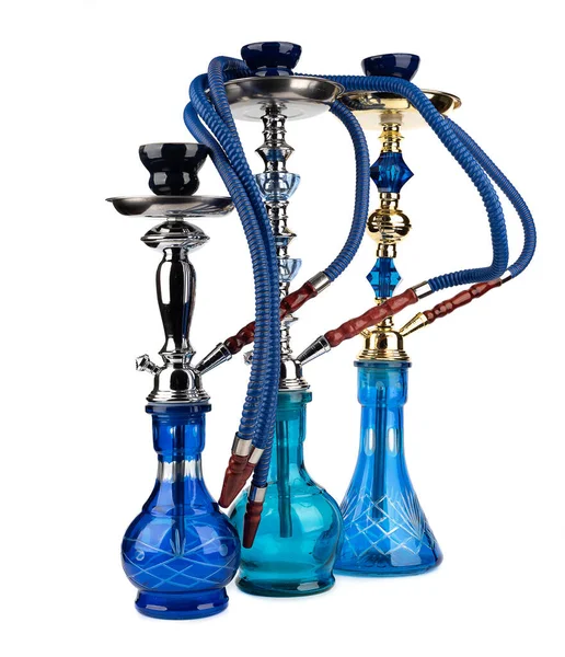 Oriental hookahs in blue glass vases and hoses. — Stock Photo, Image