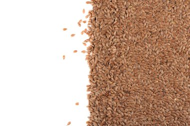 Metin için yeri olan beyaz bir arkaplanda keten tohumları.