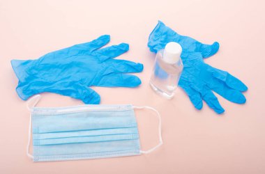 Soğuk algınlığına karşı kişisel koruma: eldivenler, dezenfektan ve tıbbi maske. Üst Manzara. Kapat..