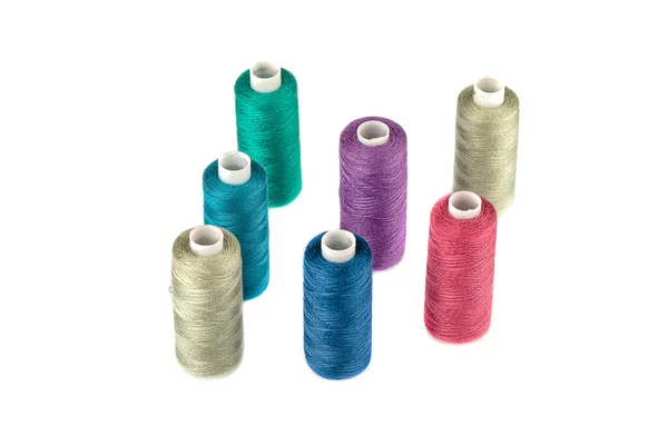 Top view of colorful spools of thread isolated on white background. — Stock Photo, Image