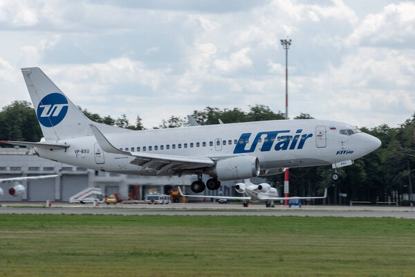 July 2, 2019, Moscow, Russia. Airplane Boeing 737-500 UTair Aviation Airlines at Vnukovo airport in Moscow.