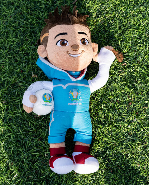 April 16, 2021 Moscow, Russia. Soft toy mascot of the European Football Championship 2020 Skillzy on the green grass of the lawn of the football stadium.