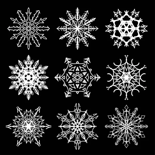 Conjunto de siluetas de copo de nieve dibujadas — Vector de stock
