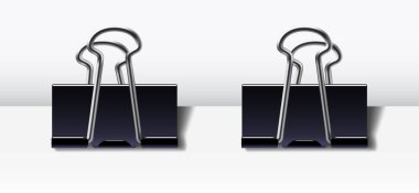 Posterin iki tarafına da raptiye yerleştirilmeye hazır. Tasarımınız için iki kıskaç