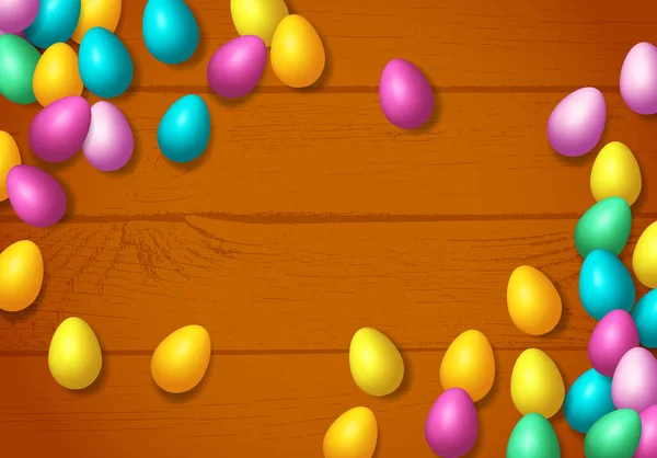 Moldura Páscoa Com Ovos Coloridos Brilhantes Espalhados Sobre Fundo Madeira —  Vetores de Stock