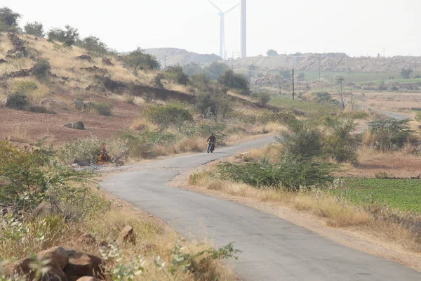 Motor Bike Rider at Rural area