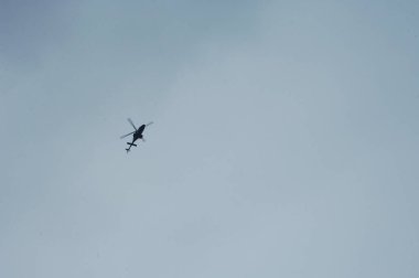 Helicopter flying close to earth