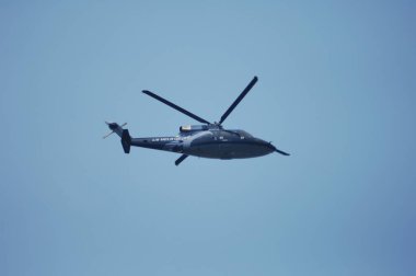 Helicopter flying close to earth