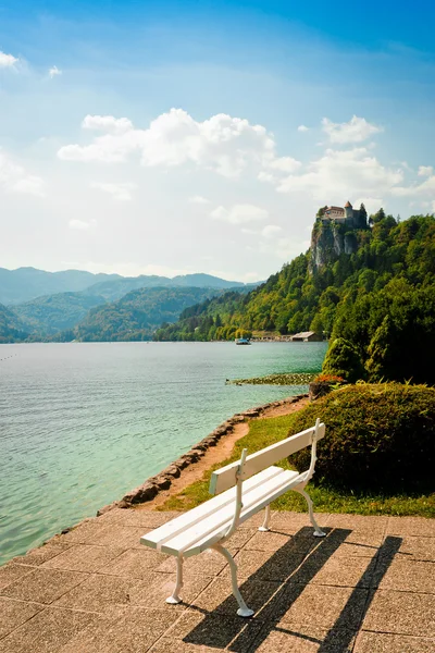 White bench on Lake Bled — Stock Photo, Image