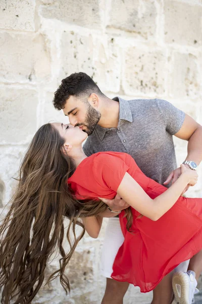 Affectionate Young Couple Kissing Front Old Wall Stock Picture