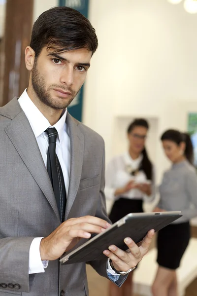 Portrait of business man in an office environment — Stock Photo, Image