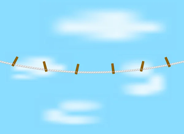 Klädnypor på rep och blå himmel — Stock vektor