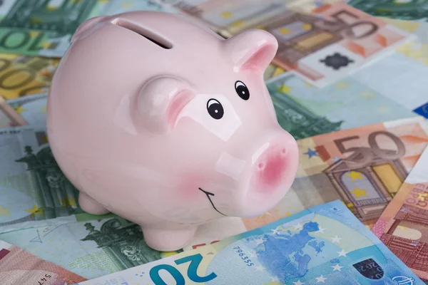 Piggy bank with money — Stock Photo, Image