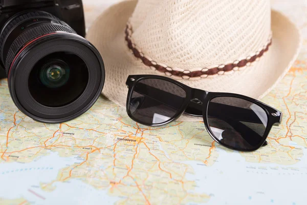 Europe map with camera and straw hat — Stock Photo, Image