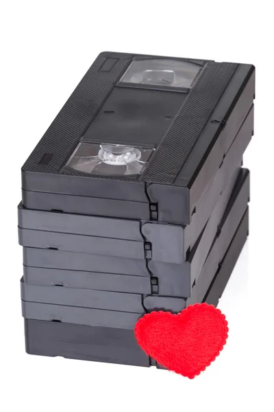 Empilement de bandes VHS avec symbole de coeur — Photo