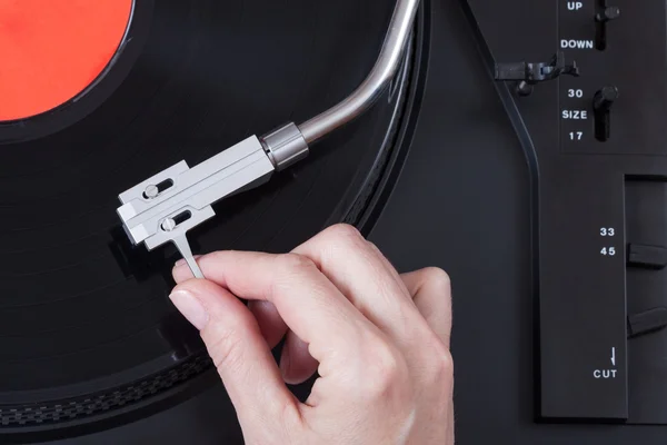 Placing the needle on a record — Stock Photo, Image
