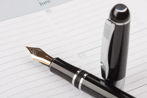 Old fountain pen and Notebook — Stock Photo, Image