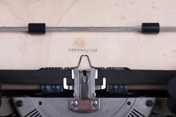 "Screenplay" typed by vintage typewriter — Stock Photo, Image