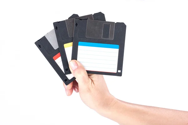 Female hand holding floppy disks — Stock Photo, Image