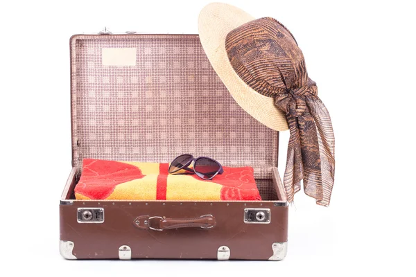 Open vintage suitcase with clothing — Stock Photo, Image