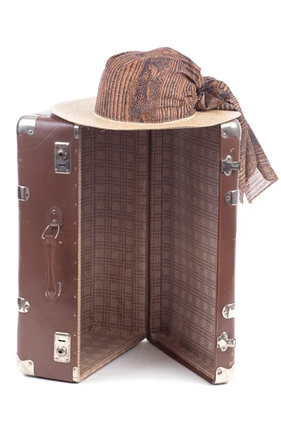 Vintage suitcase with straw hat — Stock Photo, Image