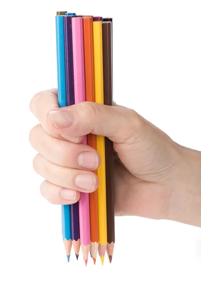 Main féminine avec un tas de crayons — Photo
