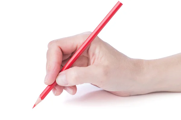 Main féminine avec un crayon rouge — Photo